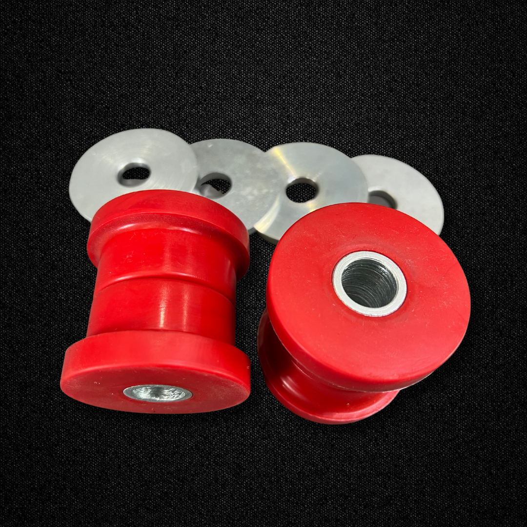 A set of urethane rear differential member bushings for a KGC10 Nissan Skyline 2000GT Hakosuka produced by MSpeed