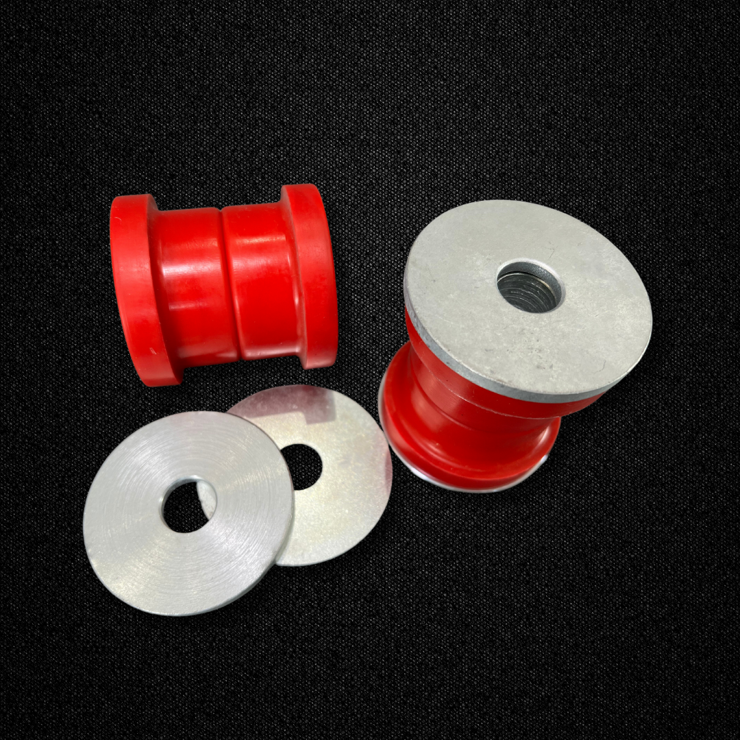 A set of urethane rear differential member bushings for a KGC10 Nissan Skyline 2000GT Hakosuka produced by MSpeed