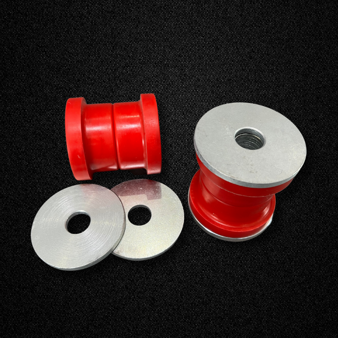 A set of urethane rear differential member bushings for a KGC10 Nissan Skyline 2000GT Hakosuka produced by MSpeed