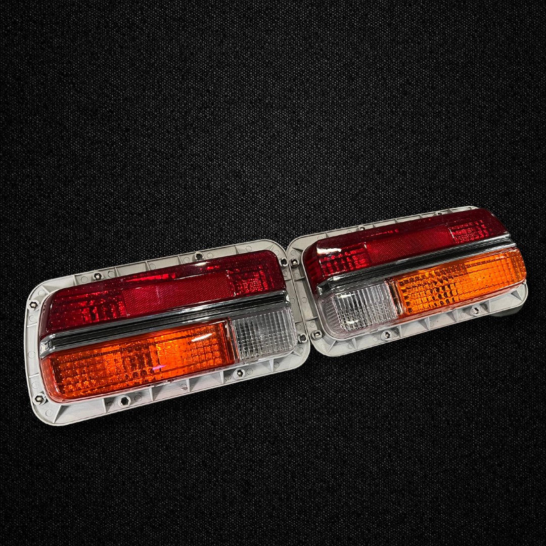 A set of half amber tail light units for a Datsun 240Z produced by MSpeed