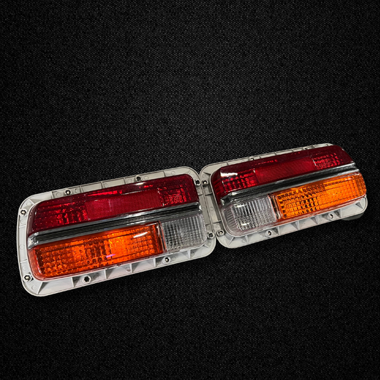 A set of half amber tail light units for a Datsun 240Z produced by MSpeed