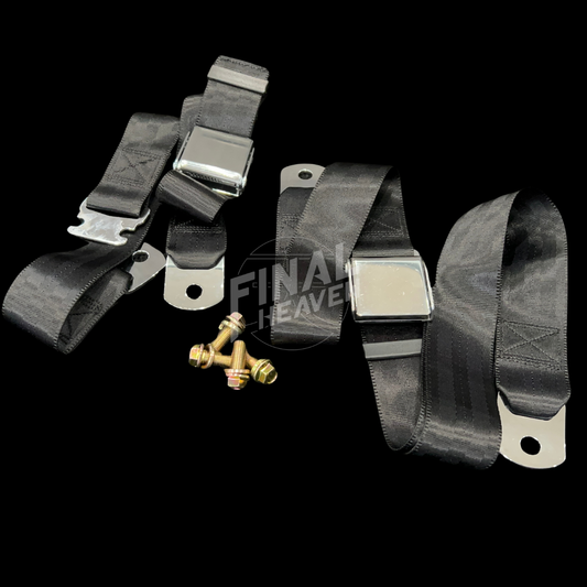 Two black vehicle seatbelts with metal buckles and bolts good for use on a KGC10 Nissan Hakosuka Skyline