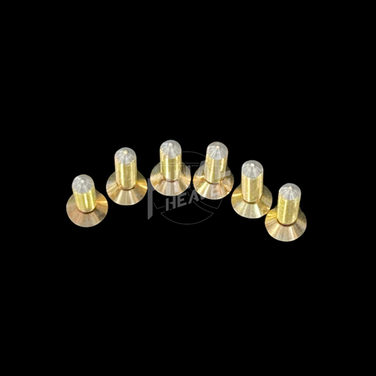 A set of six gold-colored door striker bolts for a Nissan KGC10 Hakosuka 2Dr.