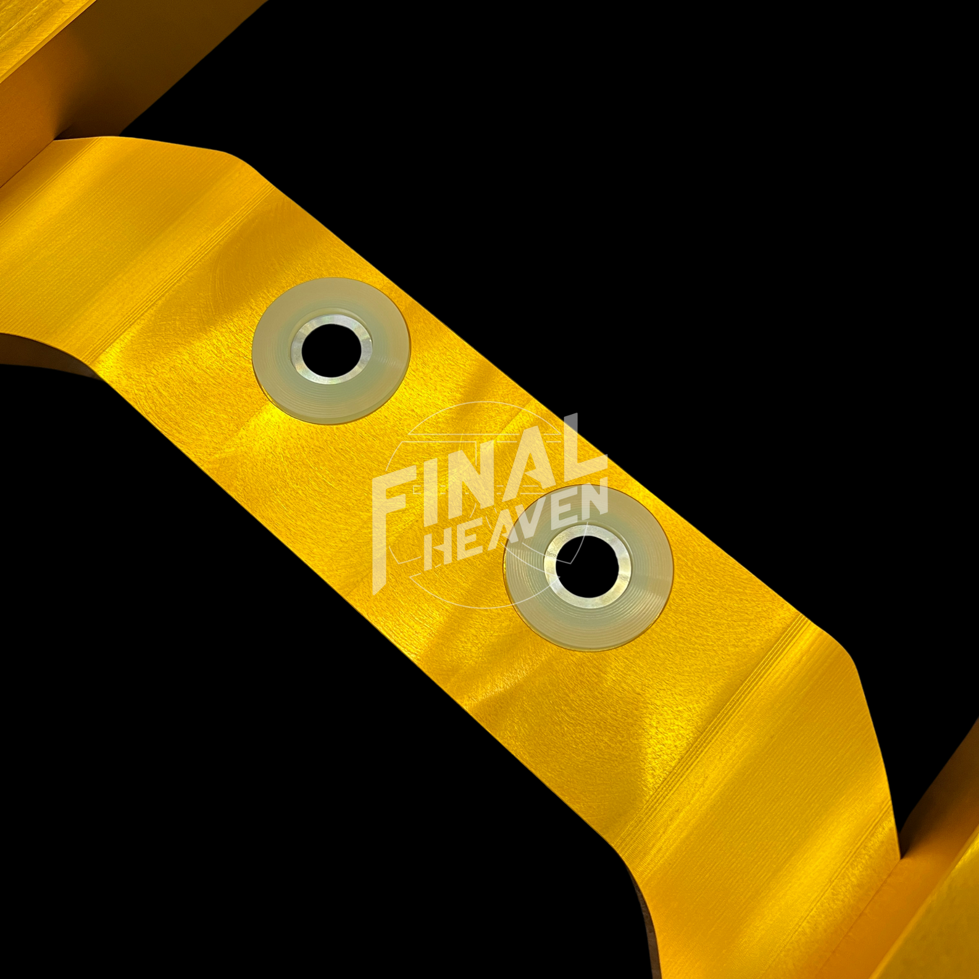 A gold-colored machined aluminum reinforced differential crossmember for Datsun 240Z 260Z or 280Z - Escort.