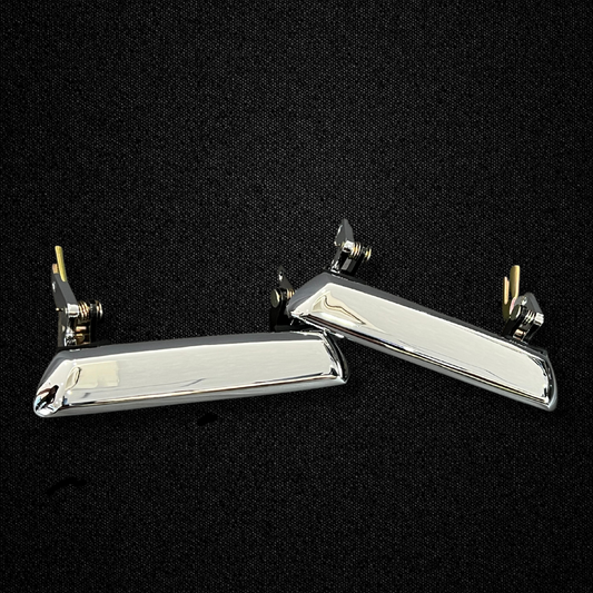 A set of outer door handles for a KGC10 Nissan Skyline 2000GT Hakosuka produced by MSpeed