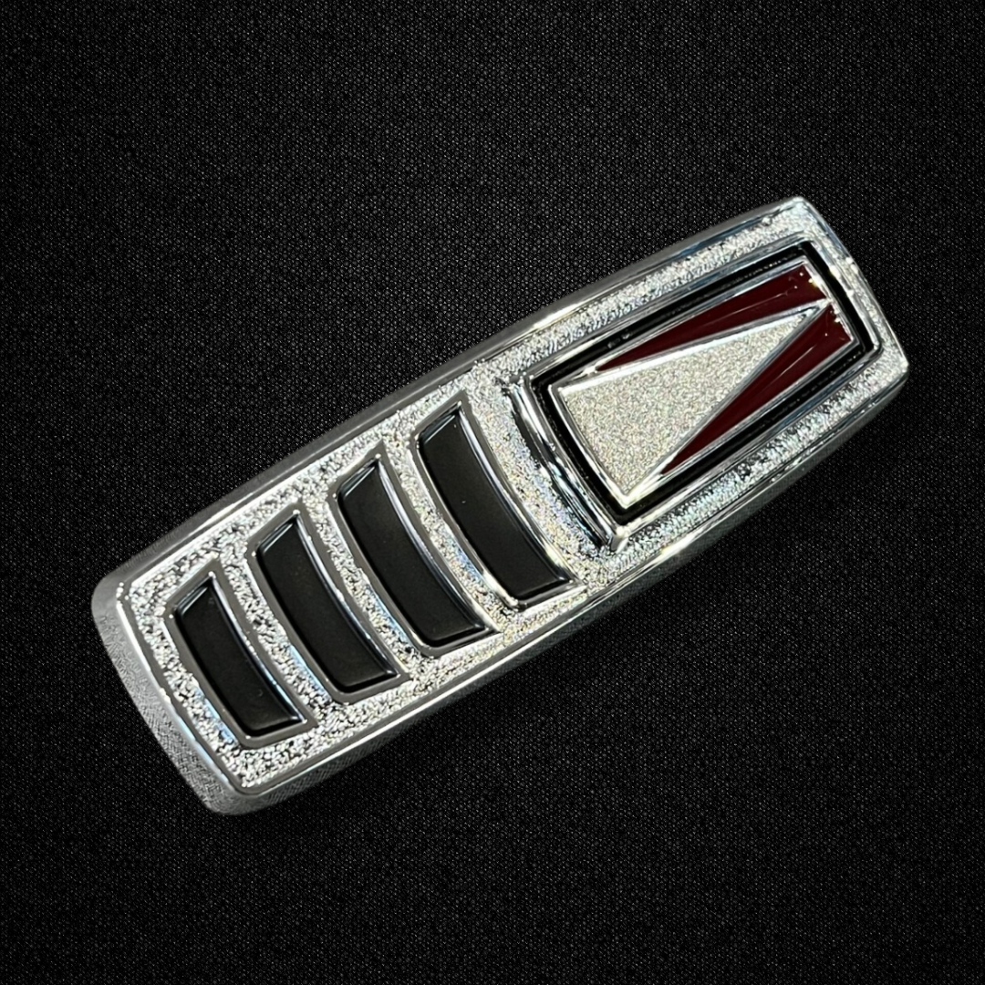 A rear fender wind cutter emblem for a KGC10 Nissan Skyline 2000GT Hakosuka produced by MSpeed
