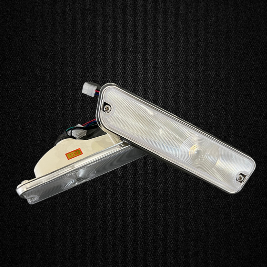 A set of 1969 style front turn signals for a GC10 Nissan Skyline 2000GT Hakosuka produced by MSpeed
