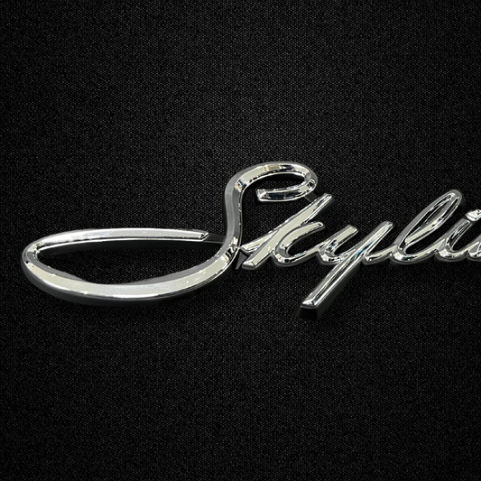 A SKYLINE front fender emblem for a KGC10 Nissan Skyline 2000GT Hakosuka produced by MSpeed