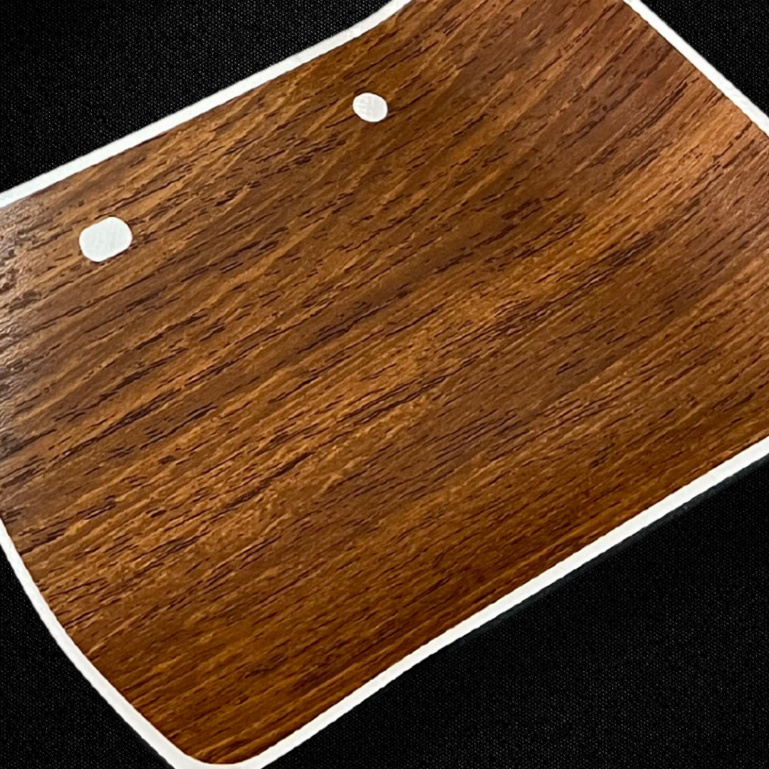 A set of center console wood pattern stickers for a KGC10 Nissan Skyline 2000GT Hakosuka produced by MSpeed