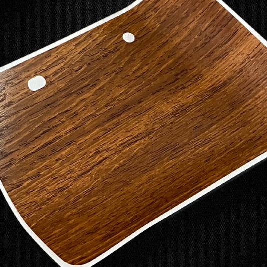 A set of center console wood pattern stickers for a KGC10 Nissan Skyline 2000GT Hakosuka produced by MSpeed