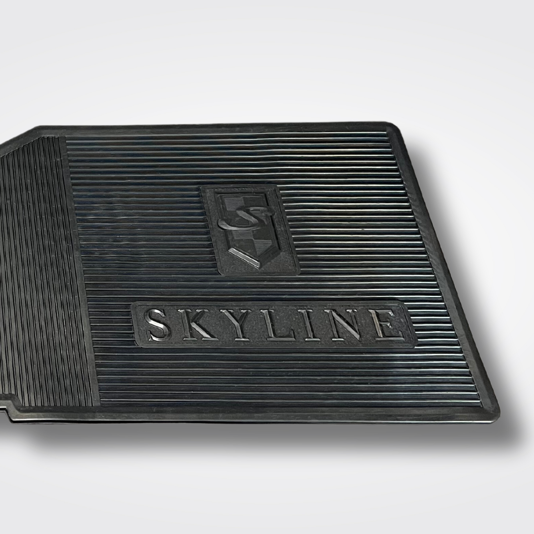 A set of rubber floor mats for a KGC10 Nissan Skyline 2000GT Hakosuka produced by MSpeed